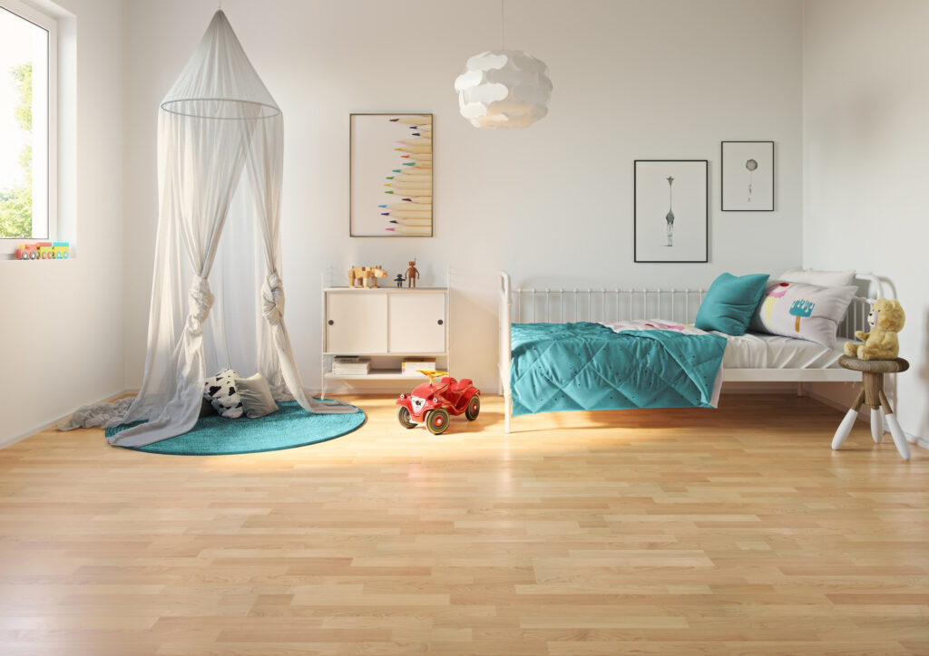 werkhaus Laminatboden in einem Kinderzimmer verlegt, der den Raum in ein warmes Raumgefühl zaubert.